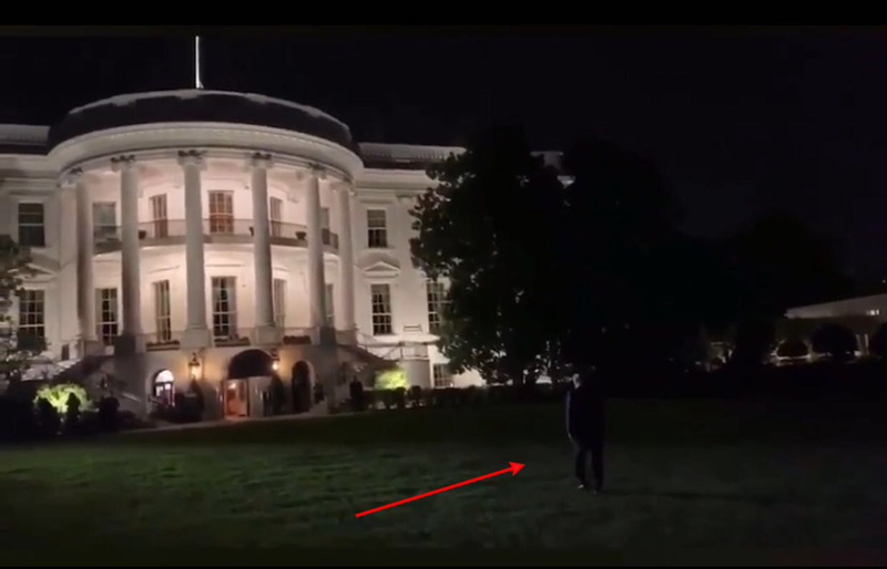 Trump walking to White House at night